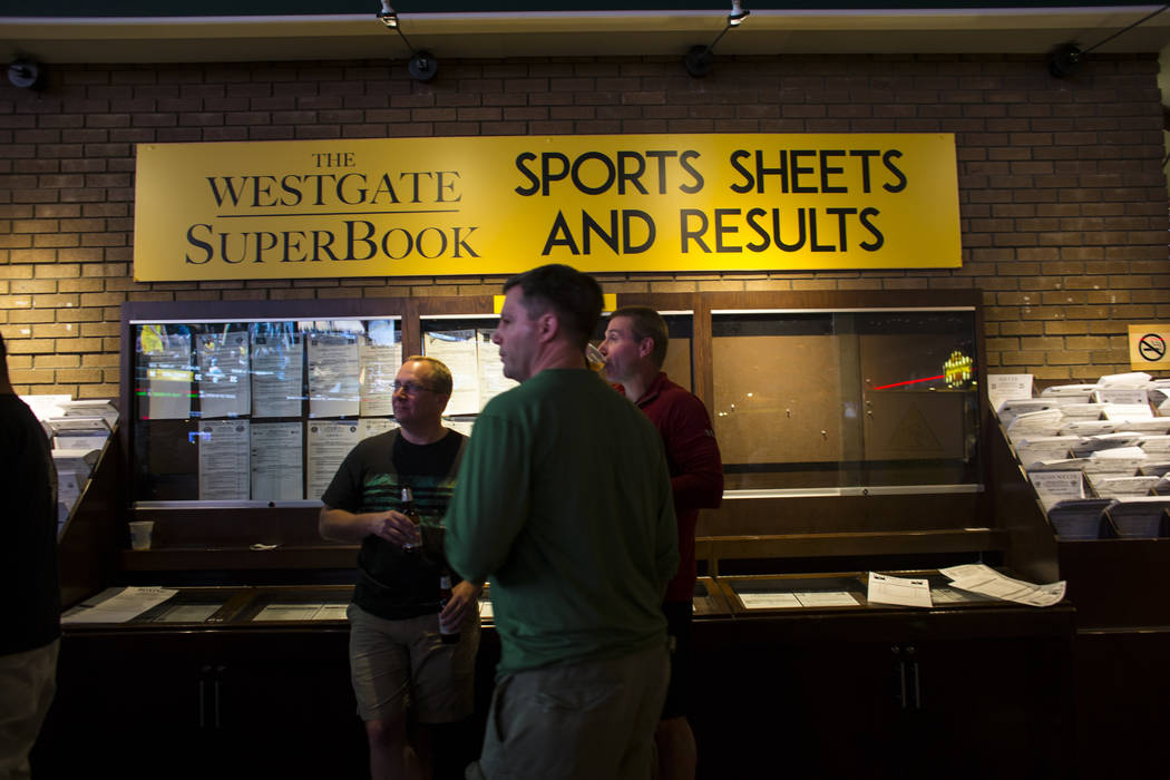 Fans take in the action during the first day of the NCAA basketball tournament at the Westgate sports book in Las Vegas on Thursday, March 16, 2017. (Chase Stevens/Las Vegas Review-Journal) @csste ...