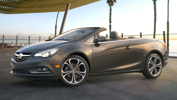 Buick Cascada Convertible, still Â¬Ã¦ front angle with roof down. Vehicle is shown in Technical Grey exterior color, ebony leather interior and 20-inch wheels.