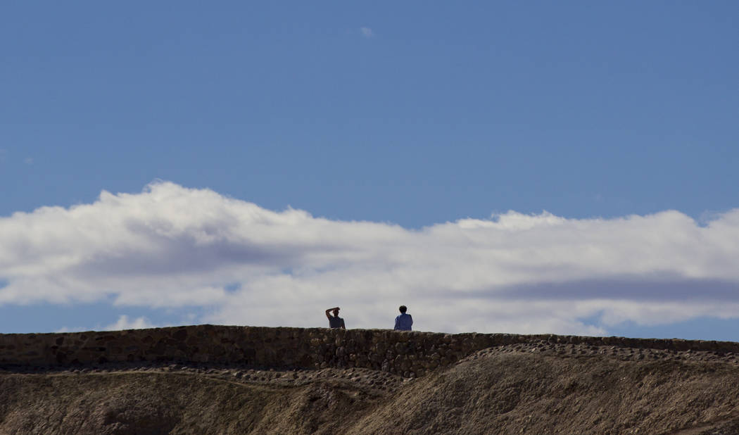 People at Zabriskie Point in Death Valley National Park on Tuesday, Feb. 28, 2017. The cover ar ...