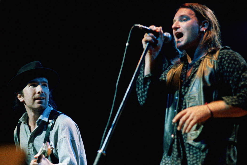 Bono, lead singer of the rock band U2 and The Edge (left) opened their world tour, April 3, 198 ...