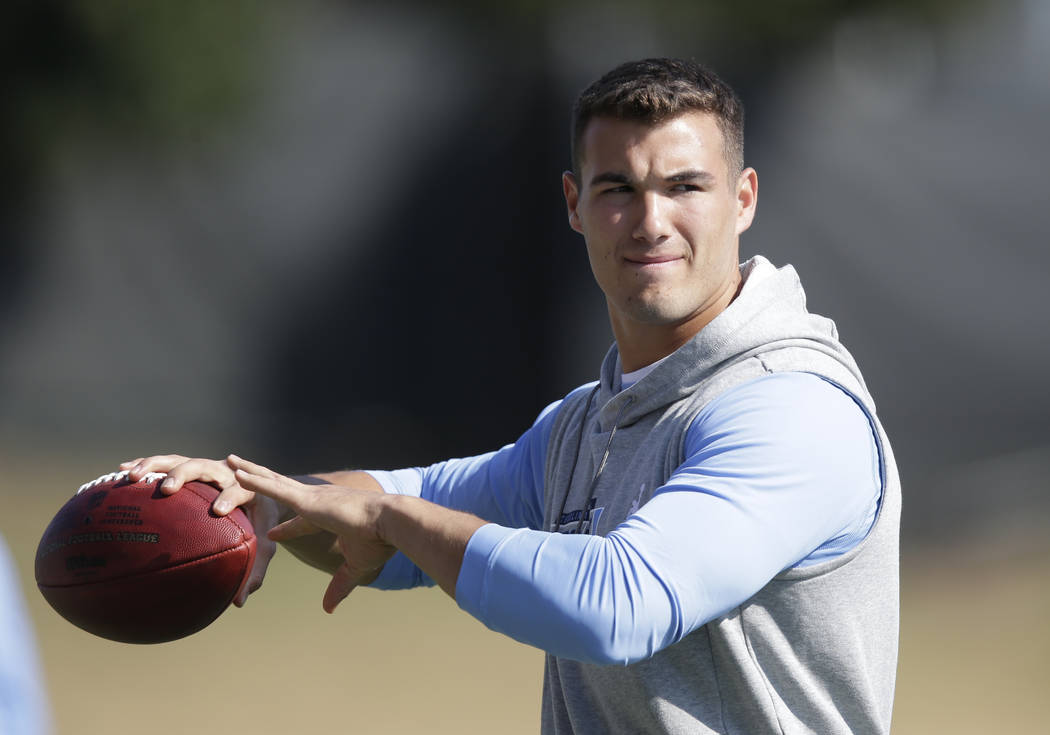 Quarterback Mitch Trubisky passes during North Carolina's pro timing football day in Chapel Hill, N.C., Tuesday, March 21, 2017. (AP Photo/Gerry Broome)