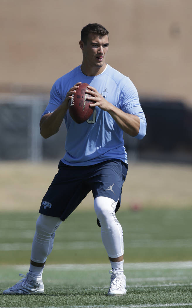Quarterback Mitch Trubisky passes during North Carolina's pro timing football day in Chapel Hill, N.C., Tuesday, March 21, 2017. (AP Photo/Gerry Broome)