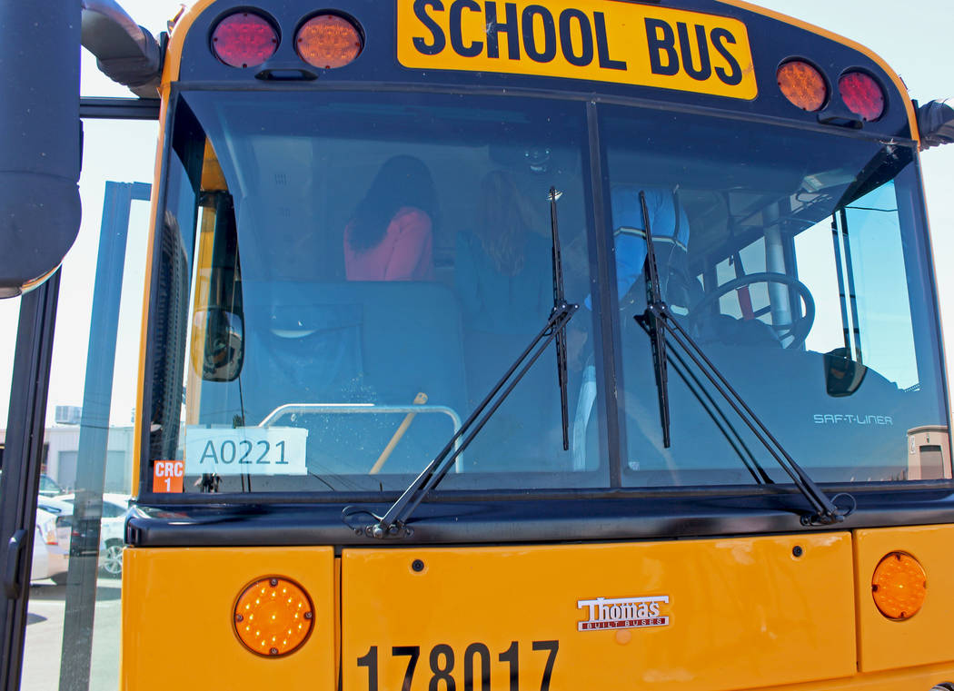 CCSD officials inviting guests onto a school bus to examine the vehicle's safety features, Friday, May 5, 2017. Gabriella Benavidez Las Vegas Review-Journal @latina_ish