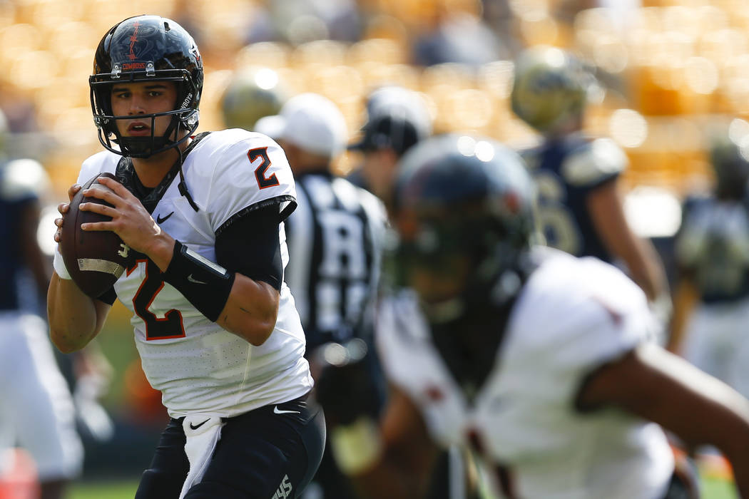 Oklahoma State quarterback Mason Rudolph (2) during warmups before an NCAA football game against Pittsburgh, Saturday, Sept. 16, 2017, in Pittsburgh. (AP Photo/Keith Srakocic)