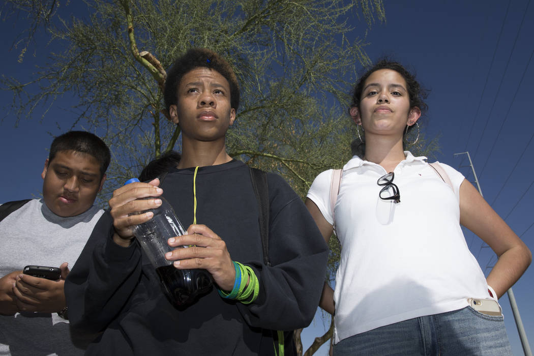 Naseem Evans, 18, left, and Nez Garduno-Padilla, 18, students concerned about budget cuts at Burk Horizon High School, are interviewed outside of their school in Las Vegas, Wednesday, Sept. 20, 20 ...