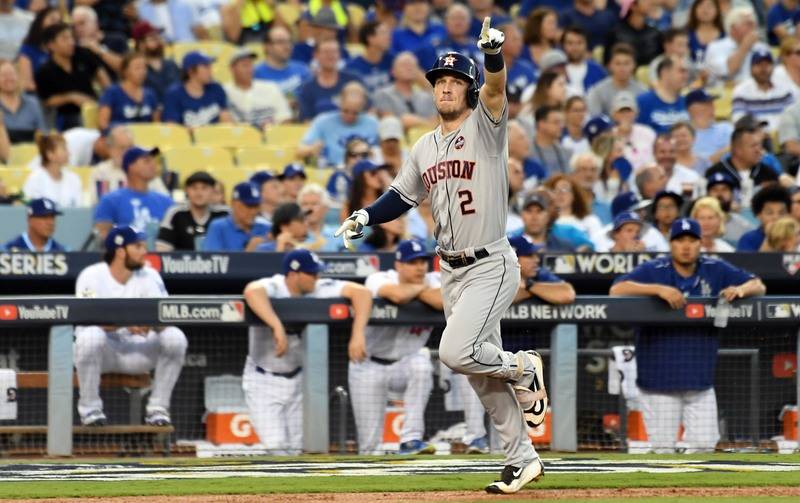 Oct 24, 2017; Los Angeles, CA, USA; Houston Astros third baseman Alex Bregman (2) celebrates as he runs home on a solo home run against the Los Angeles Dodgers in the fourth inning in game one of  ...