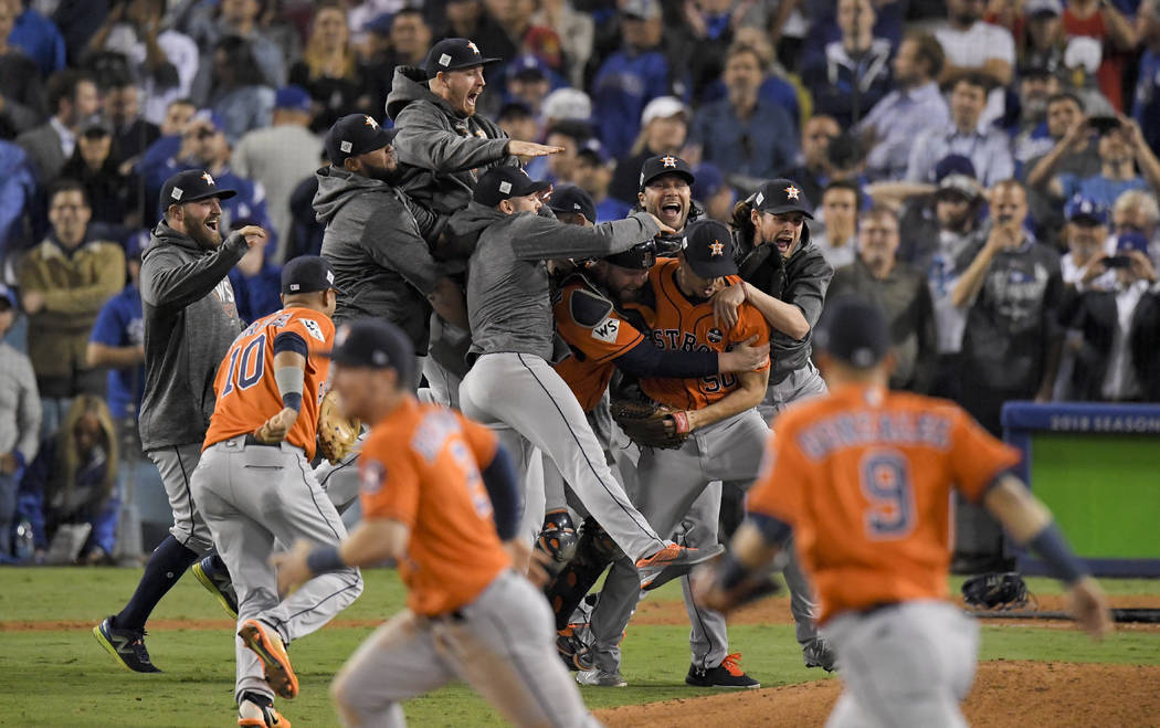The Houston Astros celebrate after their win against the Los Angeles Dodgers in Game 7 of baseball's World Series Wednesday, Nov. 1, 2017, in Los Angeles. The Astros won 5-1 to win the series 4-3. ...