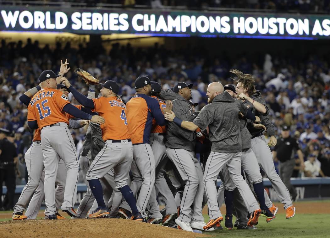 The Houston Astros celebrate after Game 7 of baseball's World Series against the Los Angeles Dodgers Wednesday, Nov. 1, 2017, in Los Angeles. The Astros won 5-1 to win the series 4-3. (AP Photo/Da ...