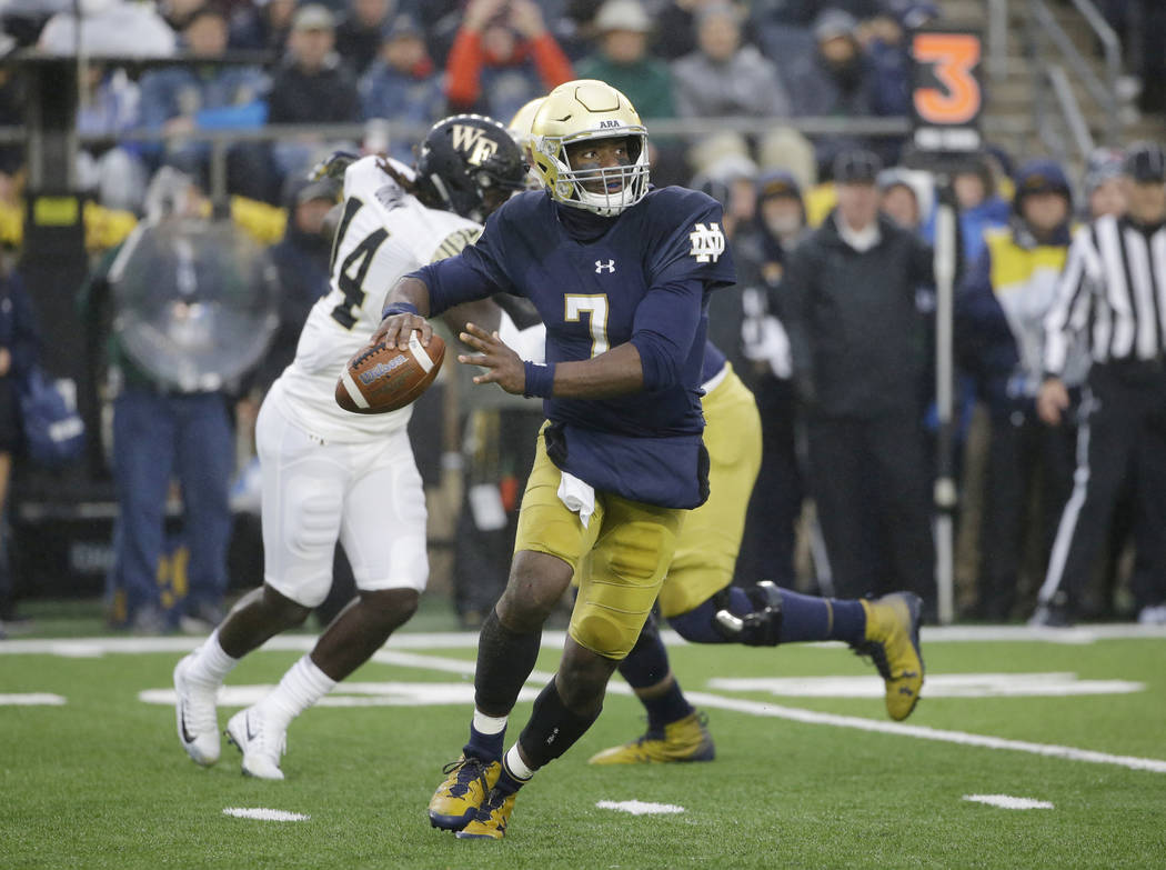 Notre Dame quarterback Brandon Wimbush looks to pass against Wake Forest during the first half of an NCAA college football game Saturday, Nov. 4, 2017, in South Bend, Ind. (AP Photo/Nam Y. Huh)