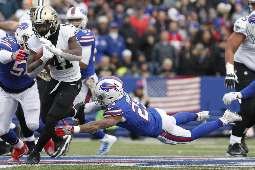 Nov 12, 2017; Orchard Park, NY, USA; Buffalo Bills free safety Jordan Poyer (21) dives to try and make a tackle on New Orleans Saints running back Alvin Kamara (41) during the second half at New E ...