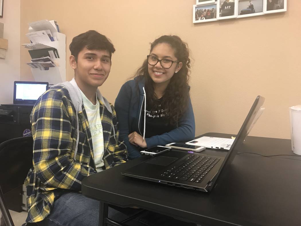 Las Vegas High seniors Elvin Recinos and Wendy Pena, Wednesday, Nov. 15, 2017, at the Leaders in Training program in Las Vegas, which allows time for students to complete college applications. Ame ...