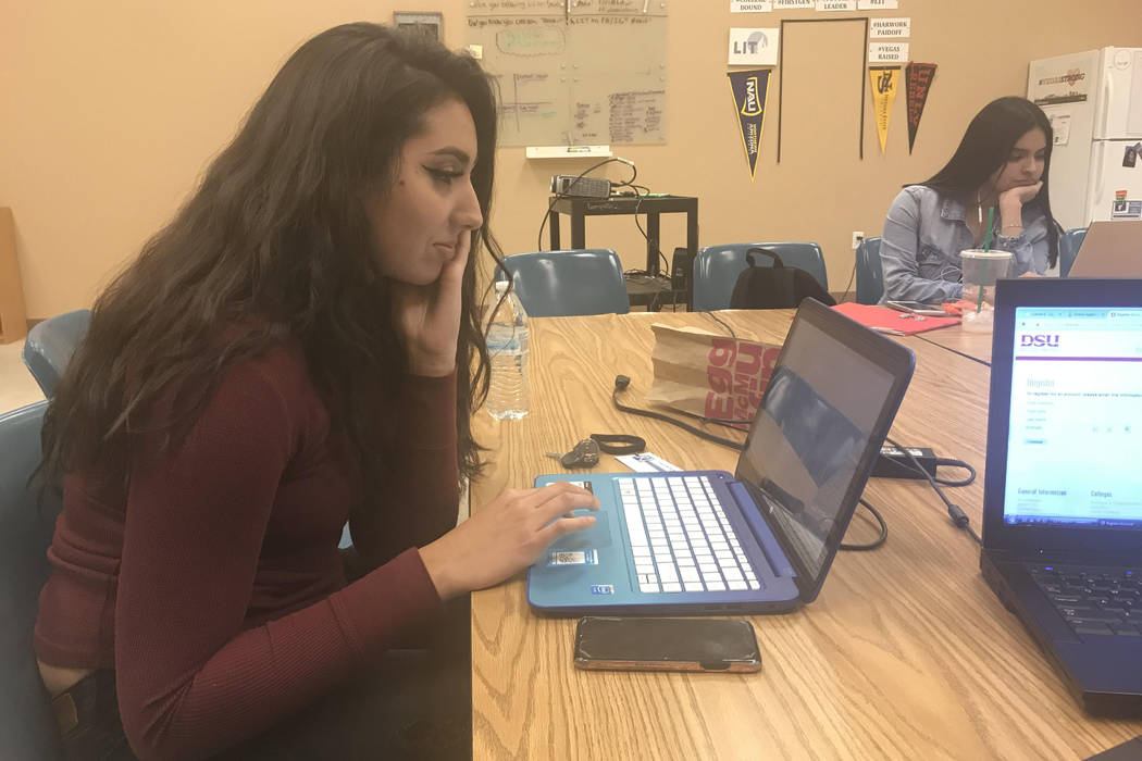 Las Vegas High School senior Michelle Gonzalez completes college applications, Wednesday Nov. 15, 2017, at the Leaders in Training nonprofit in Las Vegas that helps first-generation college studen ...
