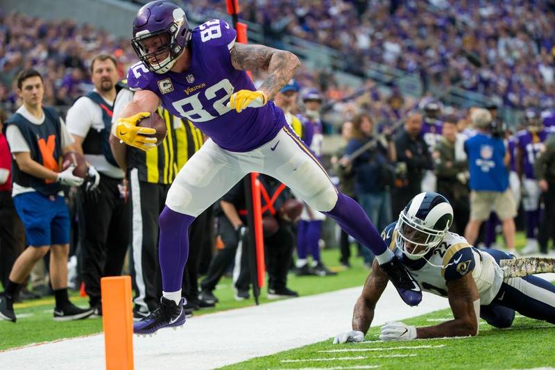 Nov 19, 2017; Minneapolis, MN, USA; Minnesota Vikings tight end Kyle Rudolph (82) catches a pass in the third quarter against the Los Angeles Rams at U.S. Bank Stadium. Mandatory Credit: Brad Remp ...