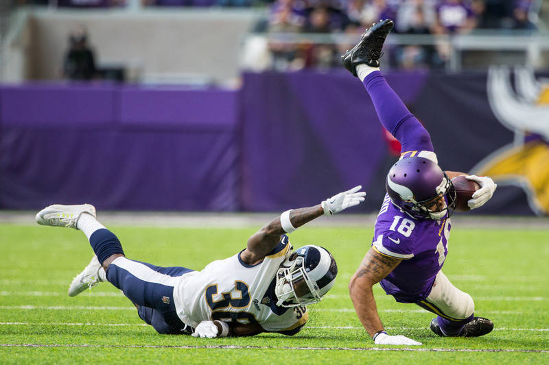 Nov 19, 2017; Minneapolis, MN, USA; Minnesota Vikings wide receiver Michael Floyd (18) is tackled by Los Angeles Rams cornerback Dominique Hatfield (36) during the third quarter at U.S. Bank Stadi ...