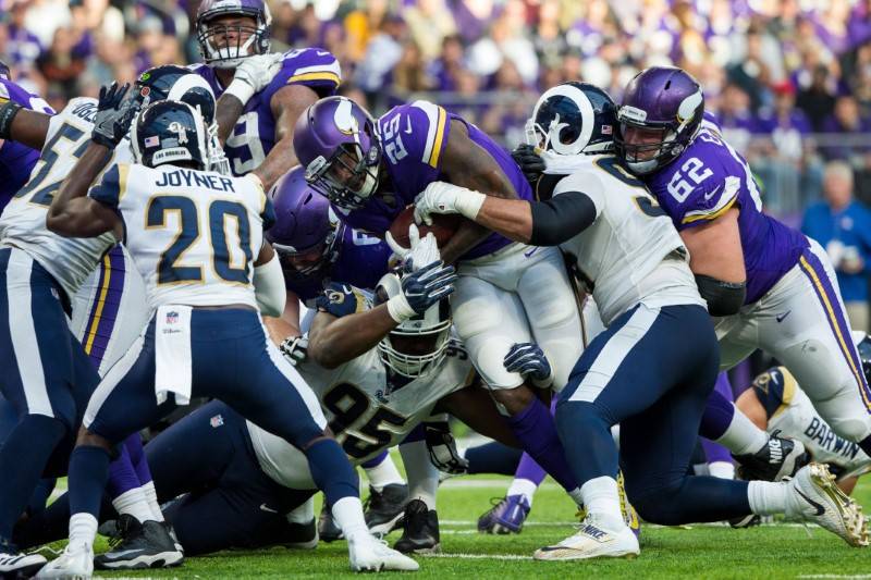 Nov 19, 2017; Minneapolis, MN, USA; Minnesota Vikings running back Latavius Murray (25) scores a touchdown in the fourth quarter against the Los Angeles Rams at U.S. Bank Stadium. Mandatory Credit ...