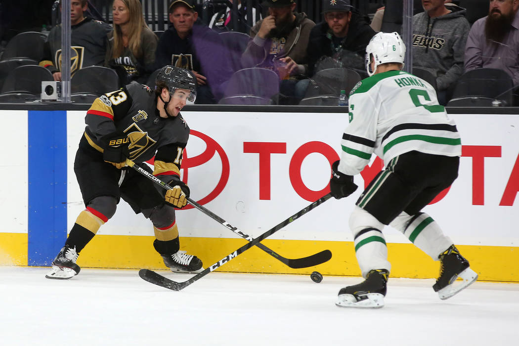 Vegas Golden Knights left wing Brendan Leipsic (13) and Dallas Stars defenseman Julius Honka (6) fight for the puck during the third period at T-Mobile Arena in Las Vegas, Tuesday, Nov. 28, 2017.  ...