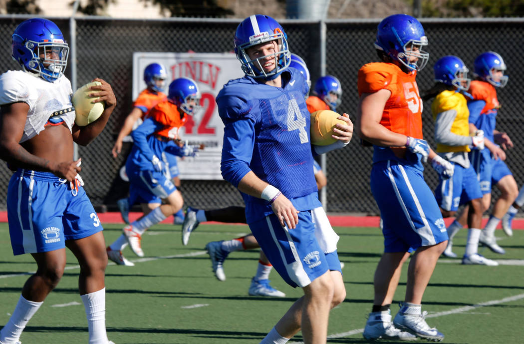 Boise State Broncos quarterback Brett Rypien (4) and his teammate warm up during a football practice at UNLV Rebel Park in Las Vegas, Wednesday, Dec. 13, 2017. Boise State Broncos and Oregon Ducks ...