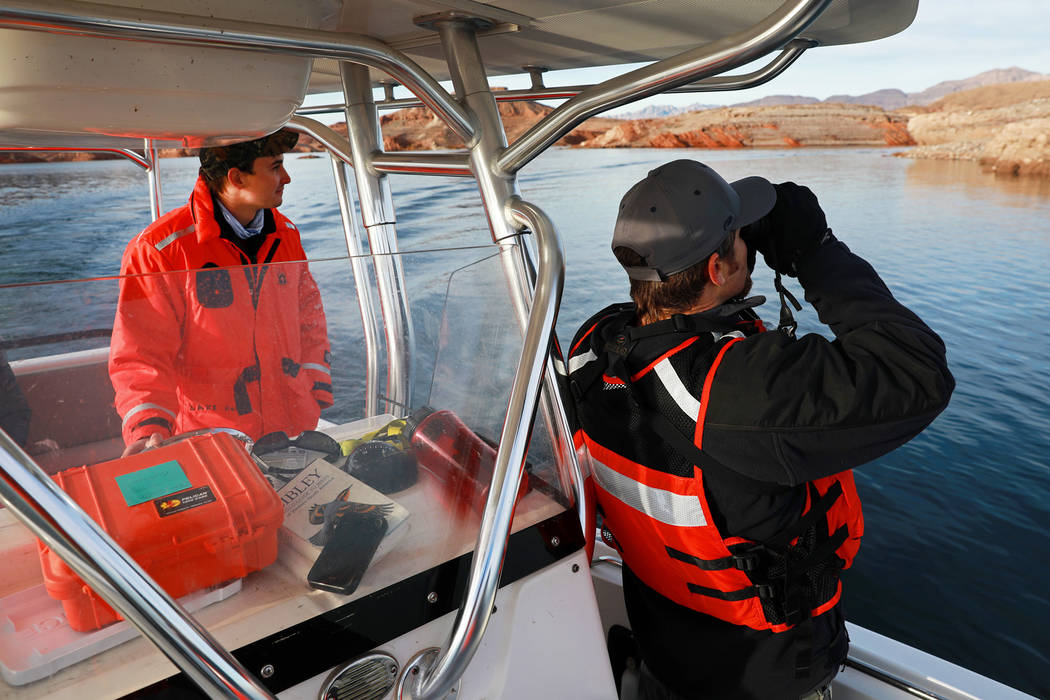 Southern Region Supervising Biologist Joe Barnes, 39, right, and environmental protections spec ...