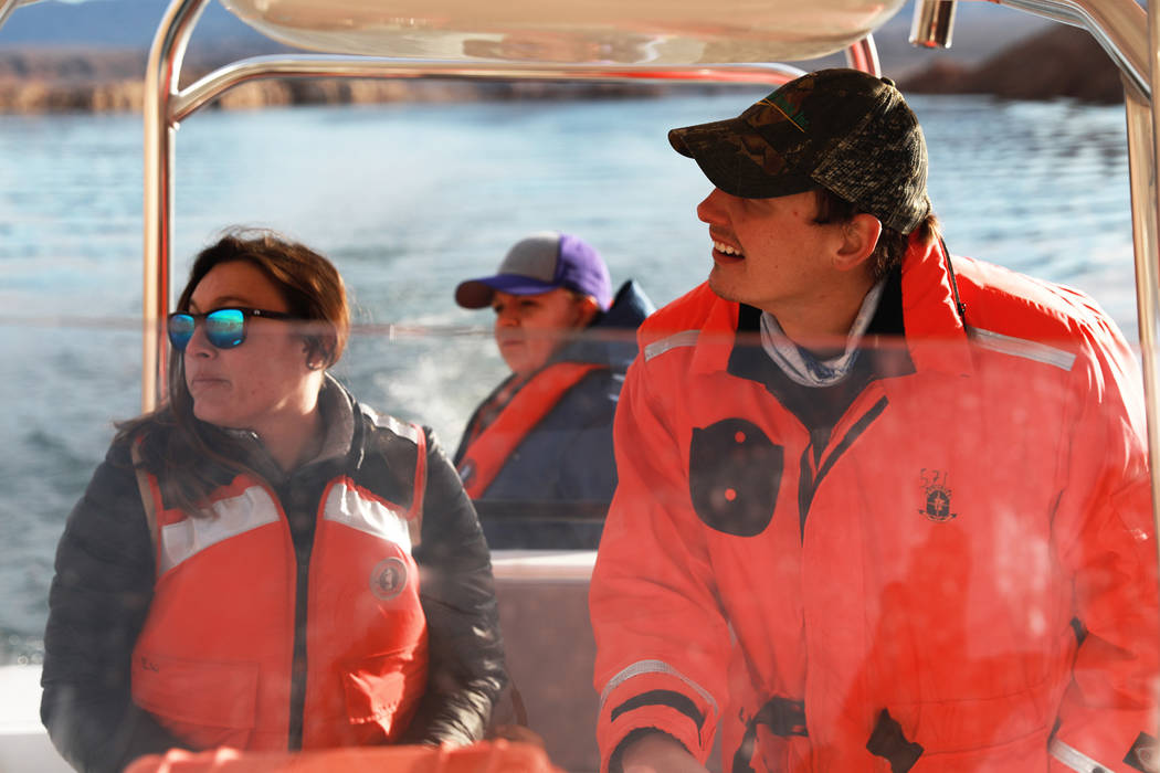 From left, Nichelle Rich, 33, and Ben Smith, 30, partake in a bald eagle survey at Lake Mead Na ...