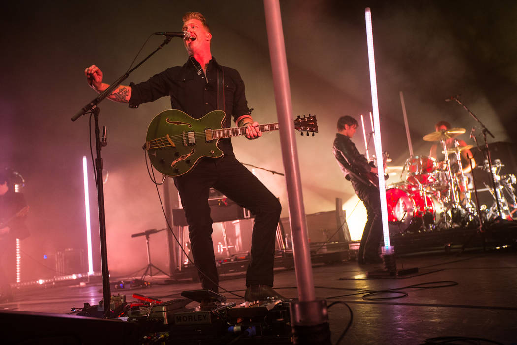 Queens of the Stone Age frontman Josh Homme, left, and guitarist and keyboardist Dean Fertita, right, perform at The Chelsea at The Cosmopolitan of Las Vegas on Friday, Feb. 16, 2018. Chase Steven ...