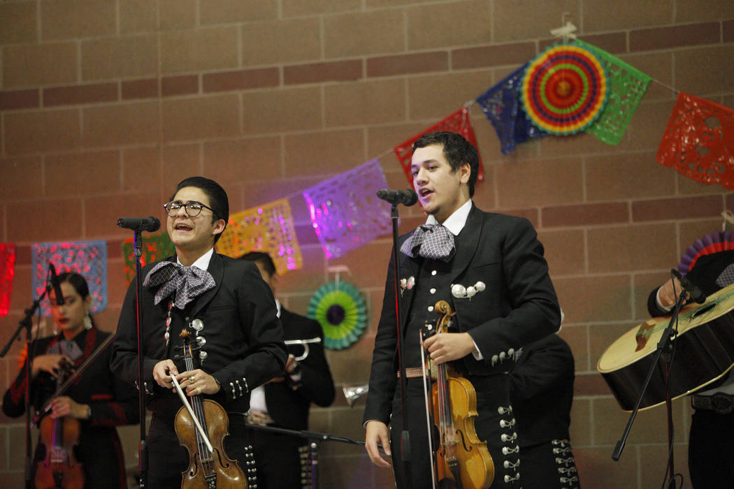 Alan Sanchez, 18, left, sings alongside Michael Blanco, 22, as part of the Mariachi Herencia de Las Vegas at Canyon Springs High School in North Las Vegas, Friday, March 9, 2018. Different groups  ...