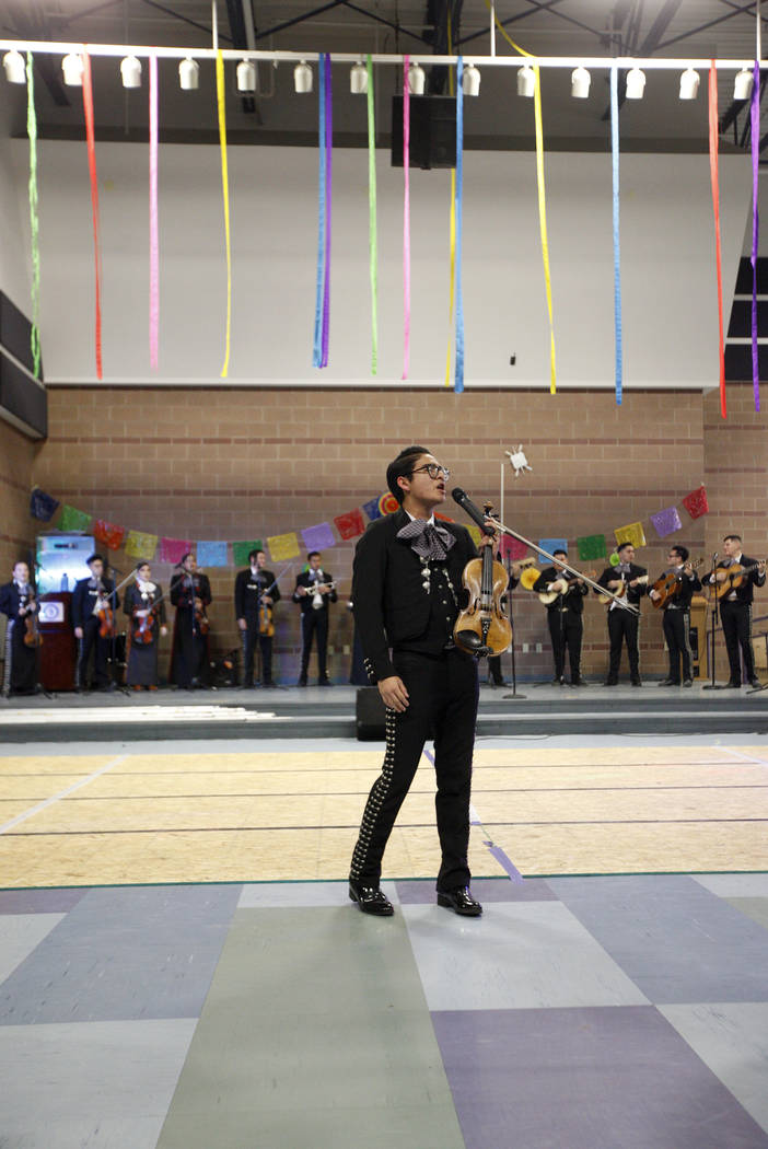 Alan Sanchez, 18, sings as part of the Mariachi Herencia de Las Vegas at Canyon Springs High School in North Las Vegas, Friday, March 9, 2018. Different groups performed to benefit the high school ...