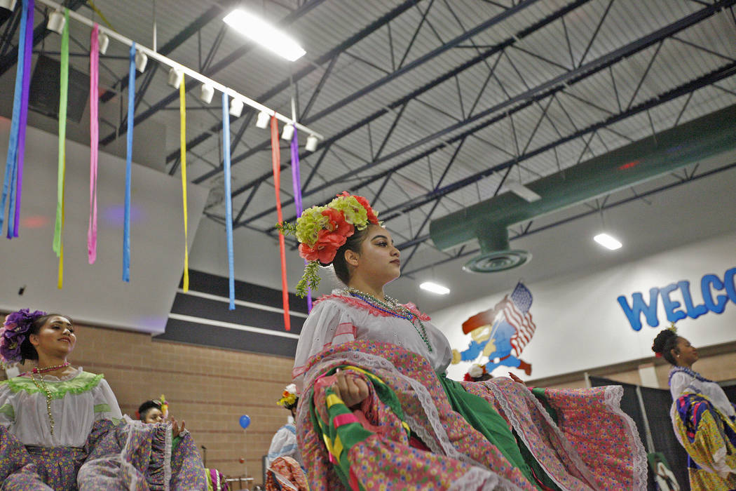Stephanie Vasquez, 16, performs Mexican folk dancing at Canyon Springs High School in North Las Vegas, Friday, March 9, 2018. Her dance group is the high school's program. Different groups perform ...