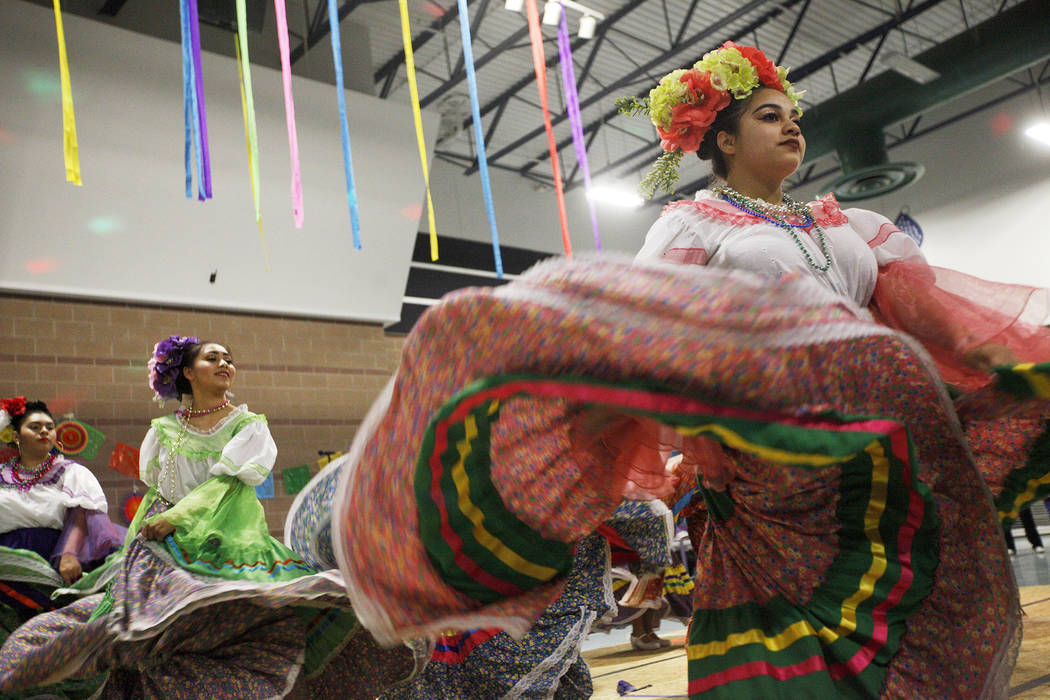 Canyon High School's Mexican folk dancing group performs at Canyon Springs High School in North Las Vegas, Friday, March 9, 2018. Her dance group is the high school's program. Different groups per ...