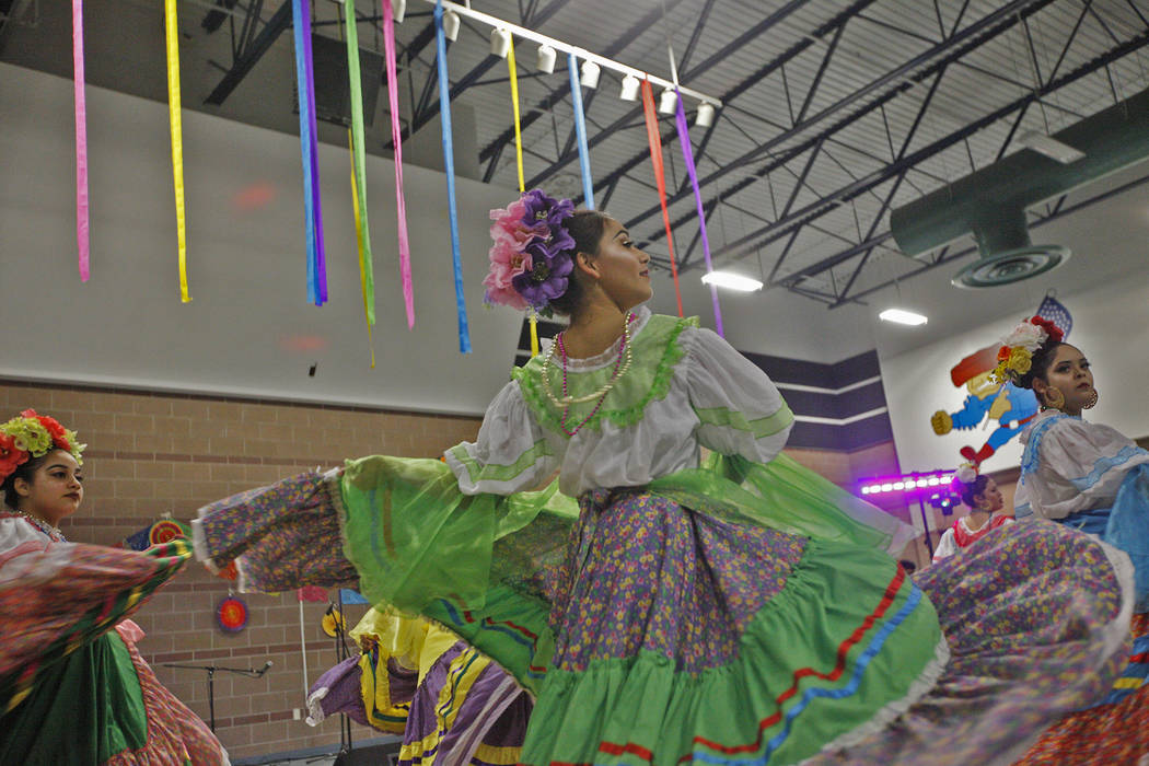Perla Murrieta, 16, performs Mexican folk dancing at Canyon Springs High School in North Las Vegas, Friday, March 9, 2018. She is in the high school's Mexican folk dancing program. Different group ...