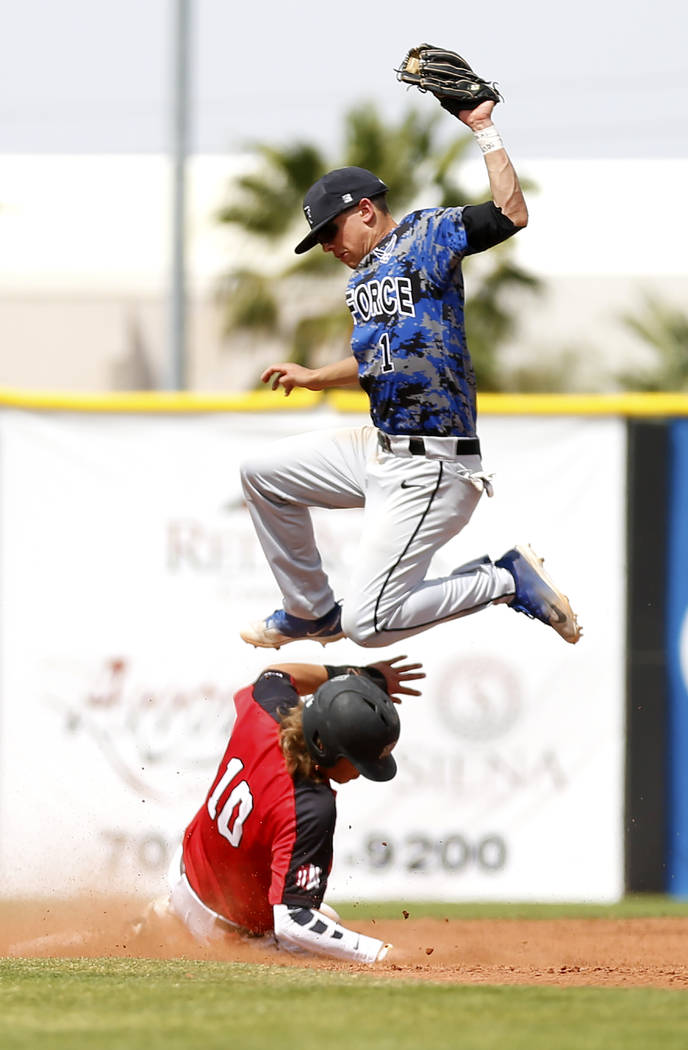 UNLV'S Bryson Stott (10) slides safely into second base against Air Force's Christian Gambale (1) during the fourth inning at the Earl Wilson Stadium in Las Vegas on Sunday, April 15, 2018. Andrea ...