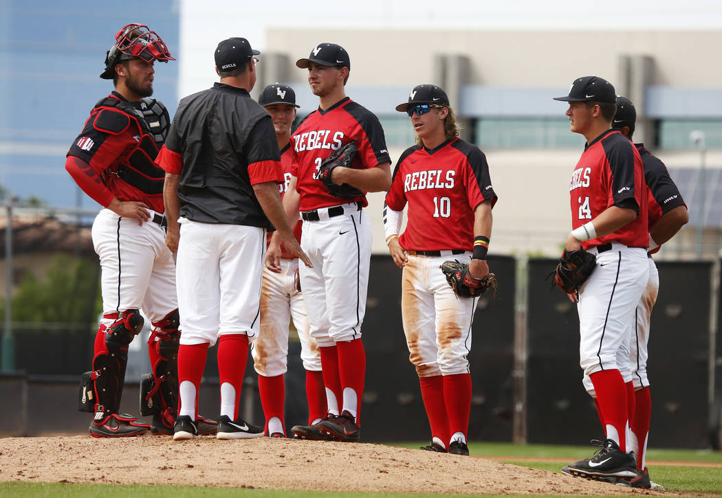 UNLV's baseball players talk during a visit to the mound against Air Force during the sixth inning at the Earl Wilson Stadium in Las Vegas on Sunday, April 15, 2018. Andrea Cornejo Las Vegas Revie ...