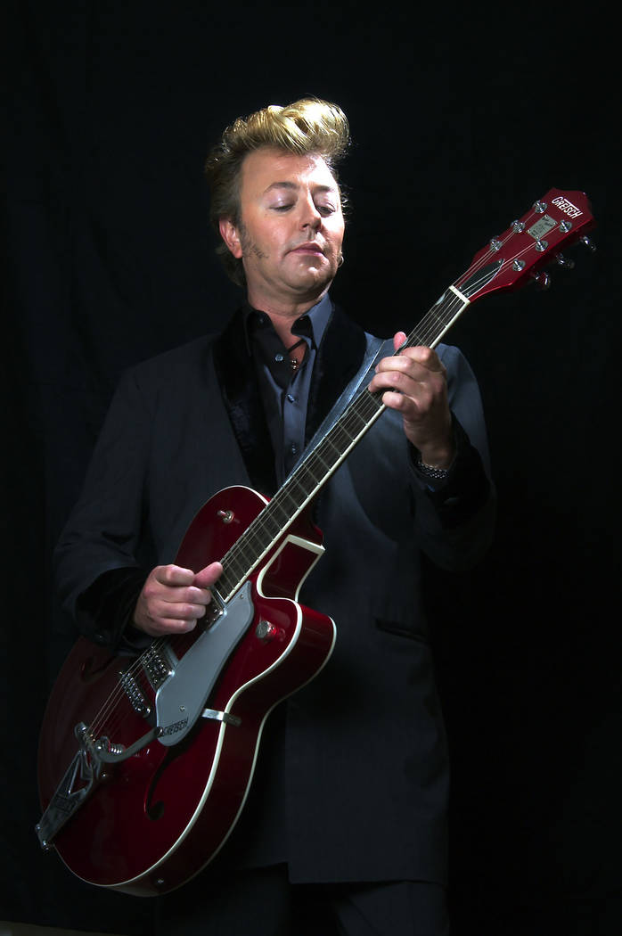 **FILE **Brian Setzer poses with his guitar in New York, in this Sept. 18, 2003, file photo. On "Wolfgang's Big Night Out," out in late September 2007, the Brian Setzer Orchestra gives a ...