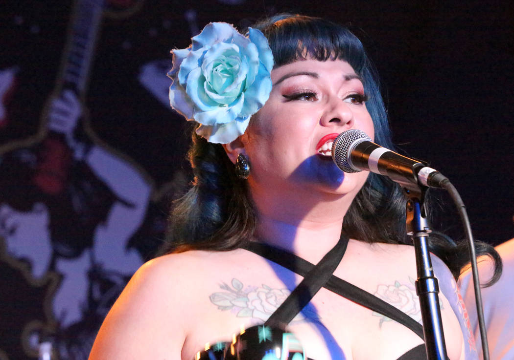 Shanda Cisneros, of local Las Vegas band Shanda and the Howlers, sings one of the band’s originals after hours at the Bailiwick Pub during the Viva Las Vegas Rockabilly Weekender at the Orleans ...