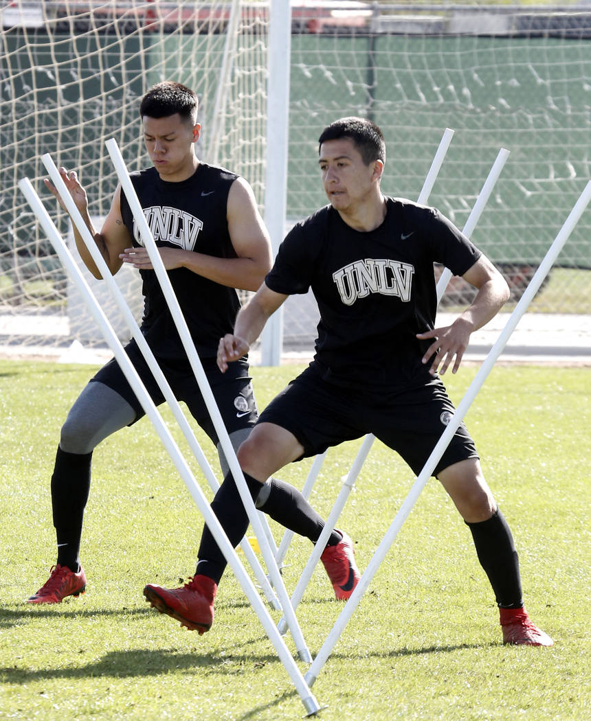 UNLV soccer midfielder Marco Gonzalez, right, and defender Ivan Farias run a drill during team practice on Wednesday, April 18, 2018, in Las Vegas. Bizuayehu Tesfaye/Las Vegas Review-Journal @biz ...