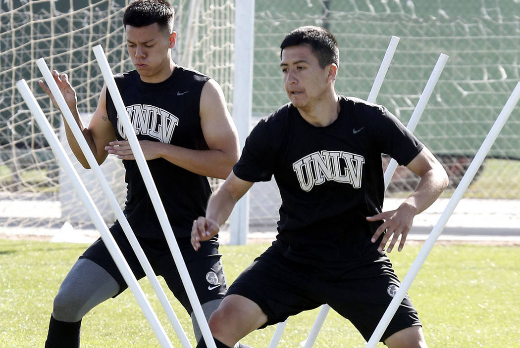 UNLV soccer midfielder Marco Gonzalez, right, and defender Ivan Farias run a drill during team practice on Wednesday, April 18, 2018, in Las Vegas. Bizuayehu Tesfaye/Las Vegas Review-Journal @biz ...