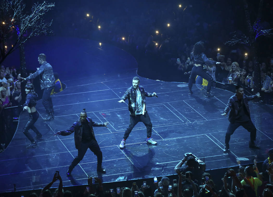 Justin Timberlake, center, performs at T-Mobile Arena in Las Vegas on Saturday, April 14, 2018. Chase Stevens Las Vegas Review-Journal @csstevensphoto