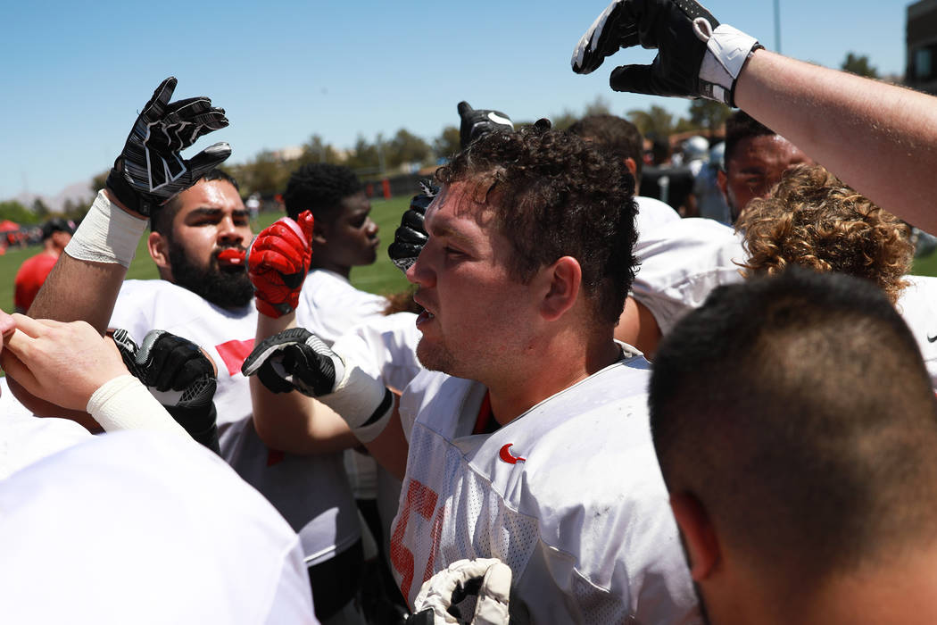 UNLV's offensive line Zack Singer (51) talks to the team before second quarter during UNLV's spring football game at the Peter Johann Memorial Field in Las Vegas on Saturday, April 14, 2018. Andre ...