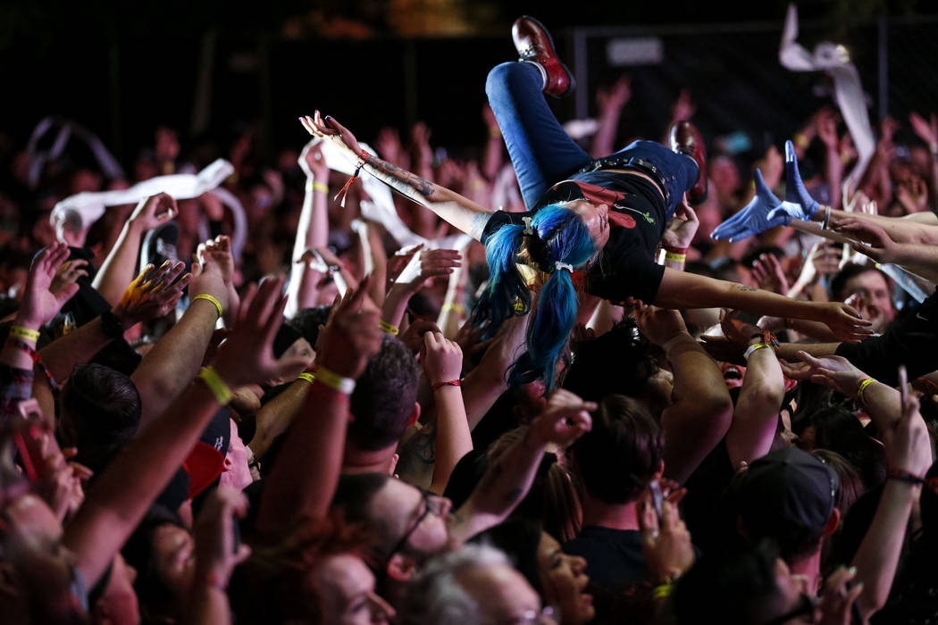 A festival-goer crowd surfs as A Day to Remember performs on day one of the second annual Las Rageous rock festival at the Downtown Las Vegas Events Center on Friday, April 20, 2018. Richard Brian ...