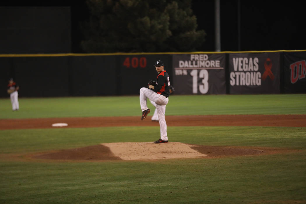 UNLV right-hander Alan Strong delivers a pitch against Iowa at Wilson Stadium on March 9. Photo courtesy of UNLV Athletics.