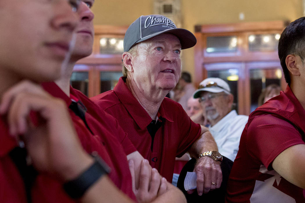 UNLV men's golf head choach Dwaine Knight, center, waits with his team to hear where they will be selected to play for regionals at the Las Vegas Country Club in Las Vegas, Thursday, May 4, 2017. ...