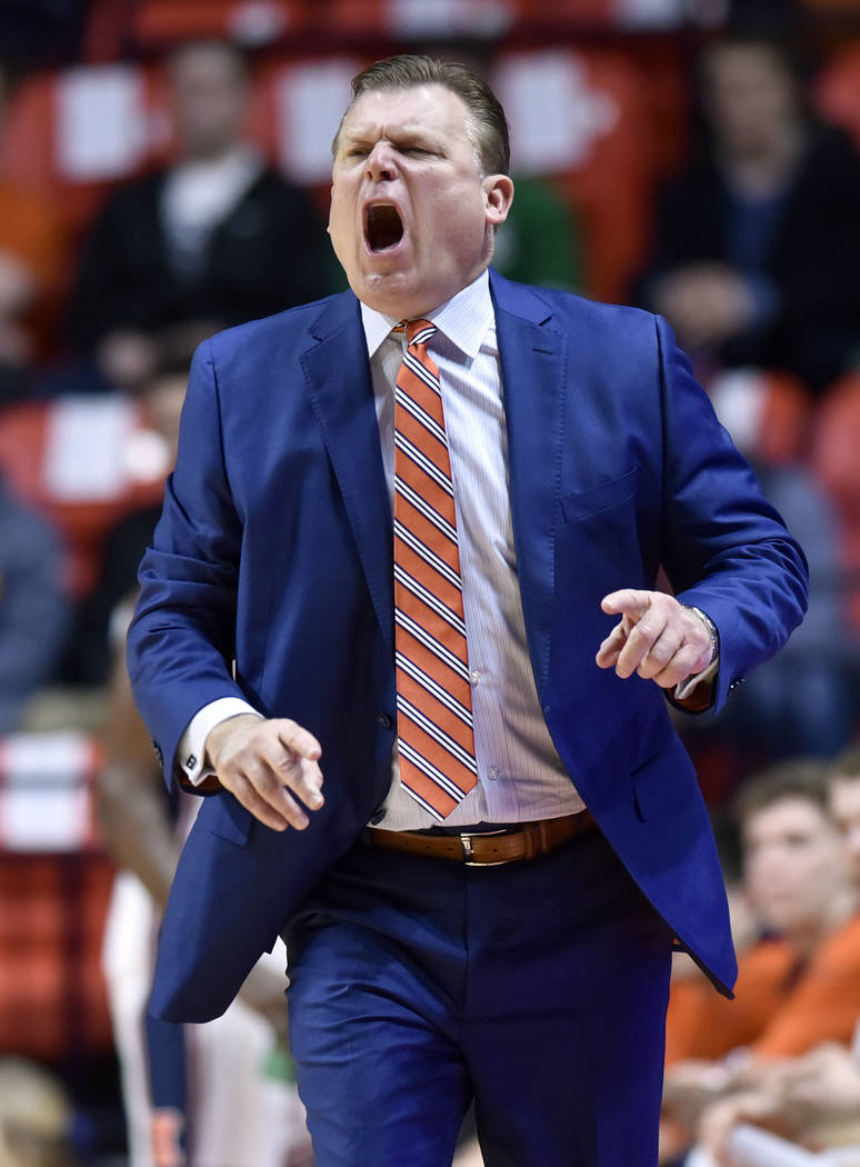Illinois coach Brad Underwood calls out from the bench during the first half of the team's NCAA college basketball game against Purdue in Champaign, Ill., Thursday, Feb. 22, 2018. (AP Photo/Stephe ...