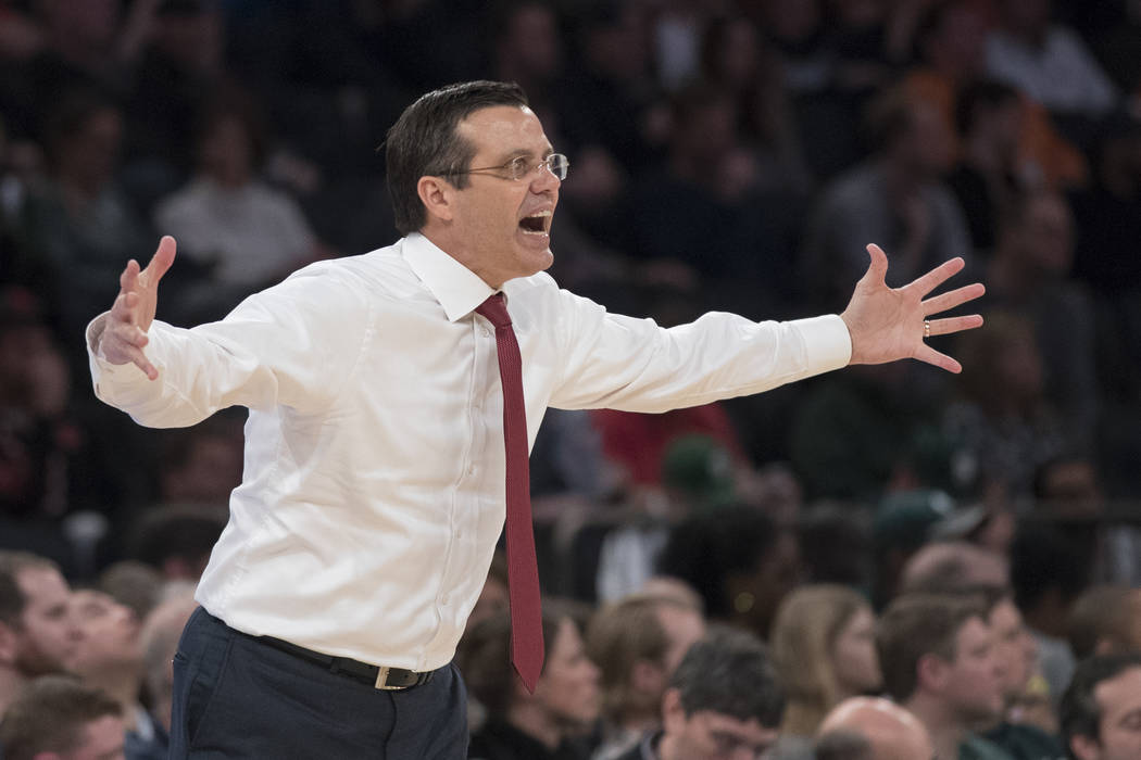 Nebraska head coach Tim Miles gestures during the first half of an NCAA college basketball game against Michigan in the quarterfinals of the Big Ten conference tournament, Friday, March 2, 2018, a ...