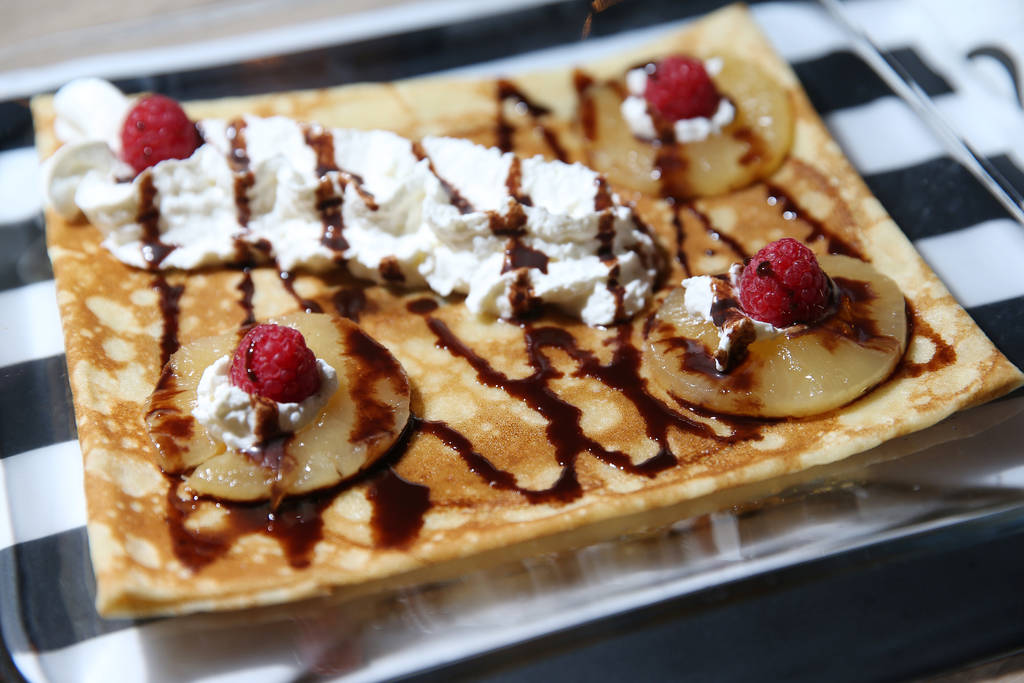 A crepe served with cooked pineapples, salted caramel, raspberries, and whipped cream, at The Real Crepe, 7595 W. Washington Ave., in Las Vegas, Tuesday, June 5, 2018. Erik Verduzco Las Vegas Revi ...