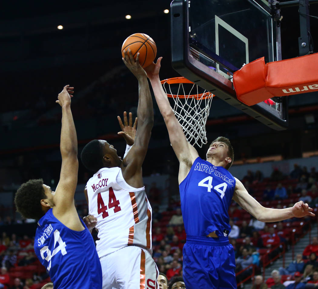 Air Force Falcons guard Keaton Van Soelen (44), right, blocks a shot from UNLV Rebels forward Brandon McCoy (44) during a basketball game at the Thomas & Mack Arena in Las Vegas on Wednesday, ...