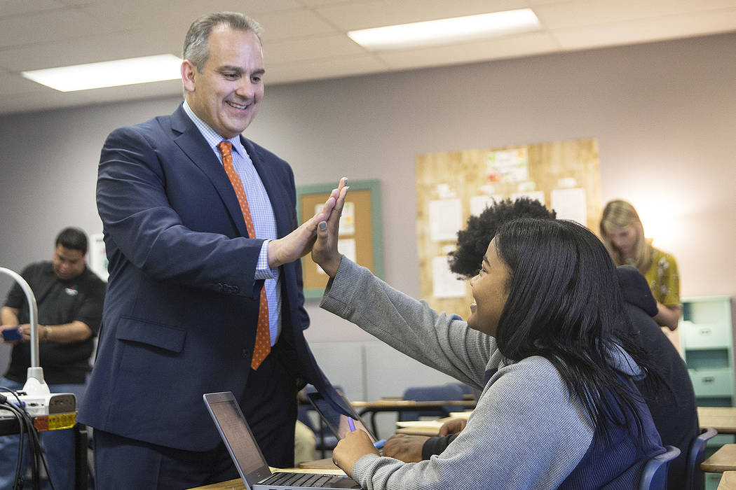 Clark County School District Superintendent Jesus F. Jara, left, greets Leeah Anderson during social studies class on a tour of Del Sol Academy of the Performing Arts on Thursday, June 21, 2018, i ...
