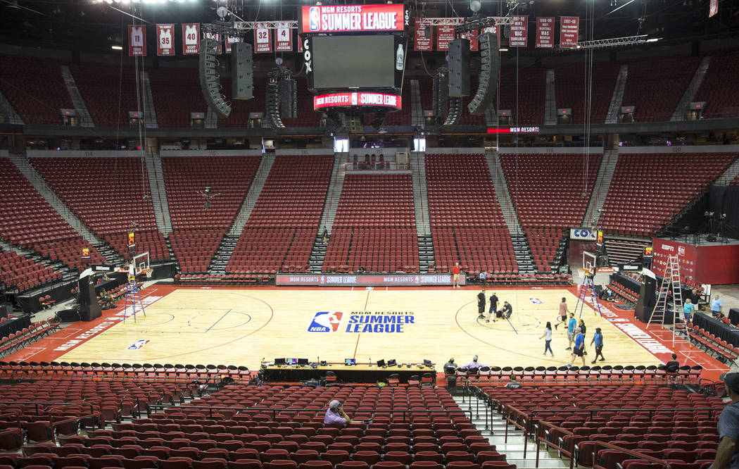 Work continues around the court ahead of the 2018 NBA Summer League basketball tournament at the Thomas & Mack Center in Las Vegas on Thursday, July 5, 2018. Richard Brian Las Vegas Review-Jou ...