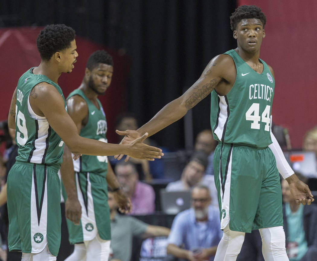 Celtics center Robert Williams (44) celebrates with forward Jarell Eddie (39) during Boston's game with the Philadelphia 76ers during NBA Summer League on Friday, July 6, 2018, at the Thomas & ...
