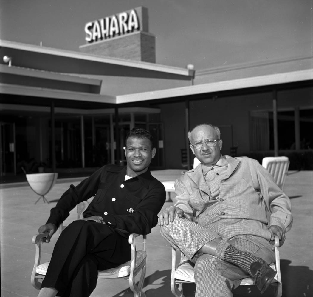 Sugar Ray Robinson and Milton Prell casino owner and developer sit at the Sahara hotel-casino i ...