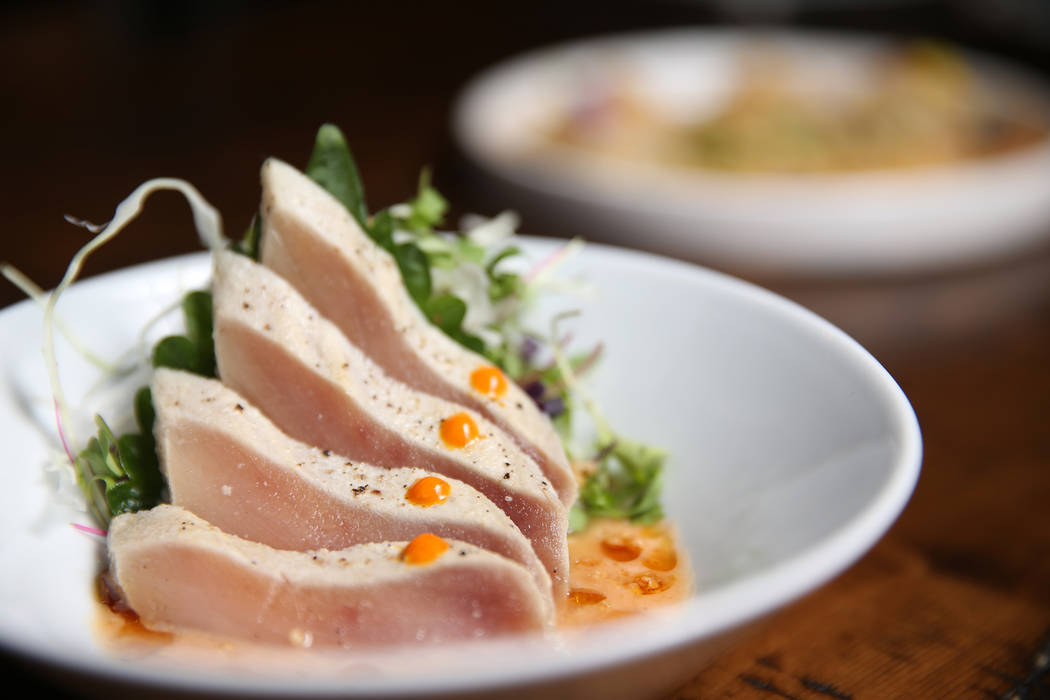 The albacore sashimi is served with seared albacore tuna, rocoto-ponzu, and popped quinoa, at Once restaurant at the Palazzo hotel-casino in Las Vegas, Wednesday, Aug. 1, 2018. Erik Verduzco Las V ...