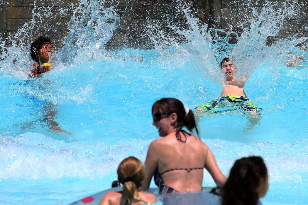 Parkgoers play at Surf-A-Rama Wave Pool at Cowabunga Bay Park in Henderson. (Bizuayehu Tesfaye/Las Vegas Review-Journal) @bizutesfaye